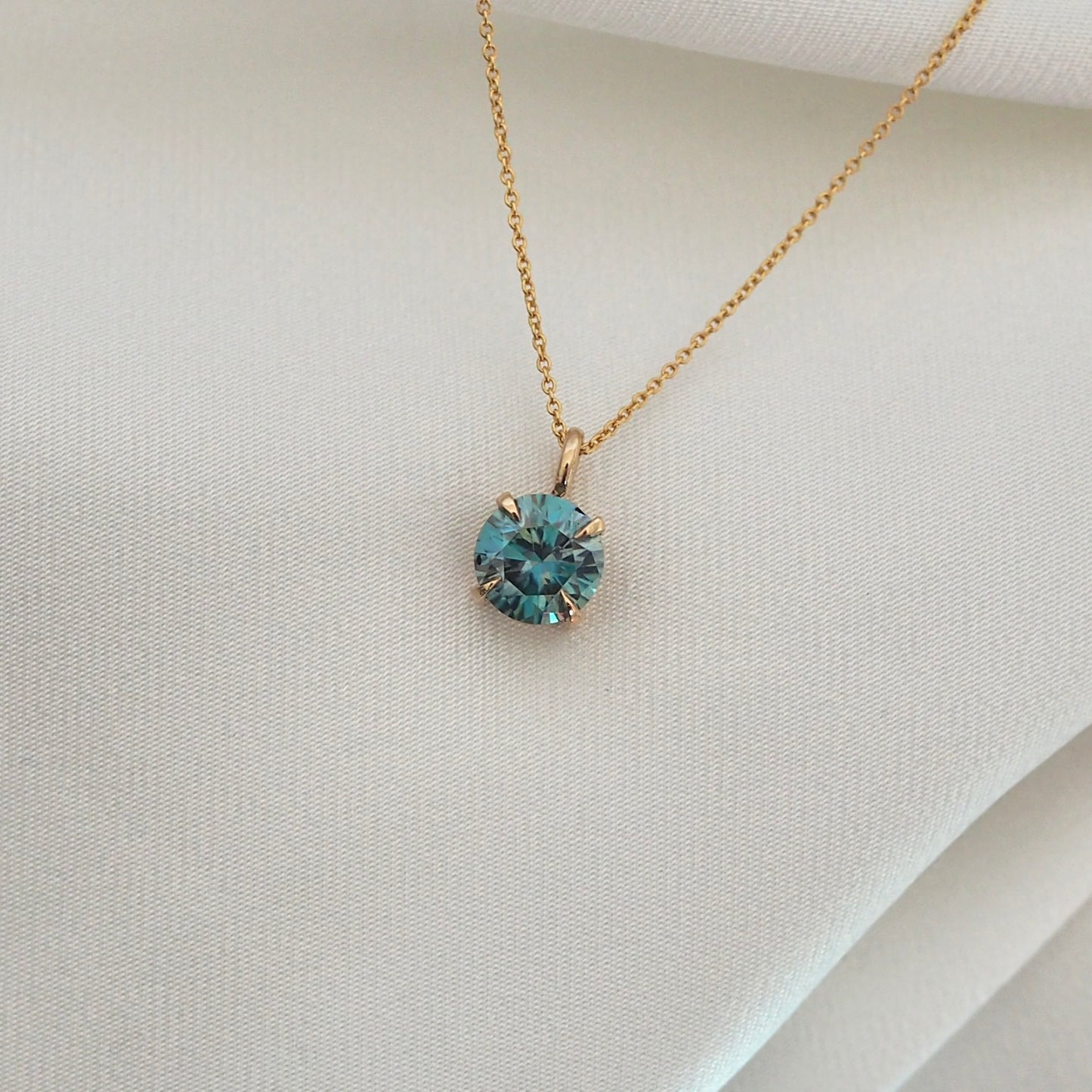 Round Blue Green Moissanite